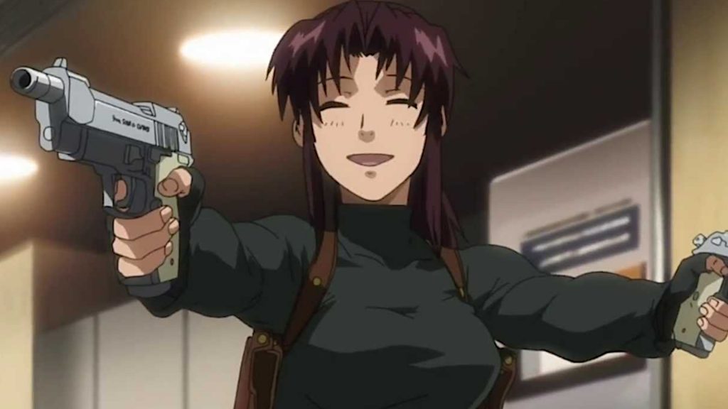 A lady smiles in a non-threating way while pointing a weapon in a very threatening way.