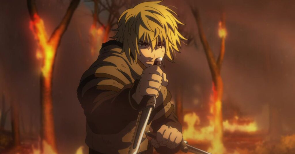 A dude with knives preparing to be smacked by another dude in a burning forest.